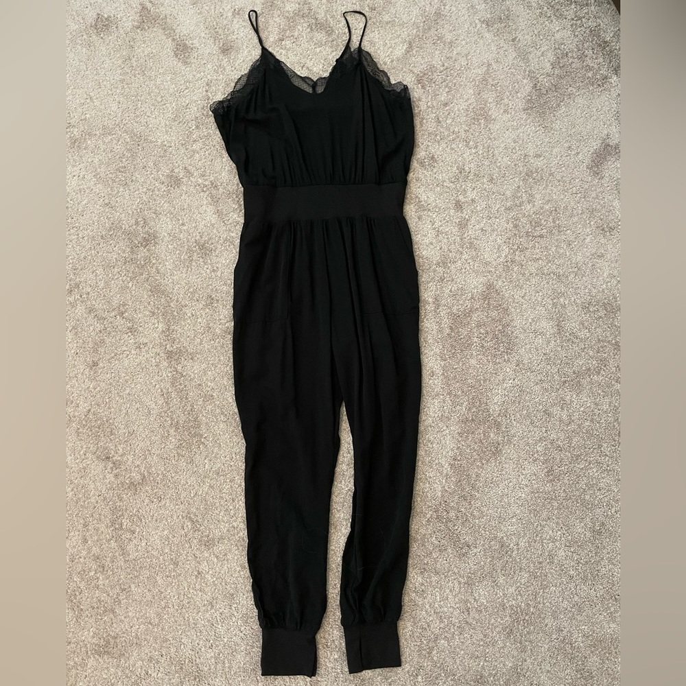 VICI black lace jumpsuit. Size XL but fits like a large.